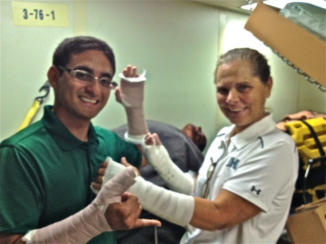 Pacific Partnership 2012 SMEE team practices bandaging 