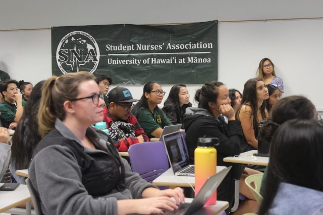 students attend educational lecture about critical care nursing
