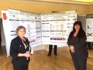 Abbie Neves and Penny Morrison present poster