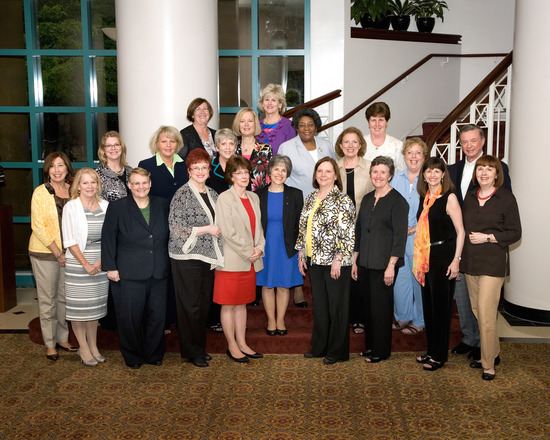 Mary G. Boland poses for group photo 