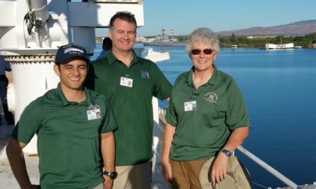 group poses for photo on USNS Mercy naval hospital ship