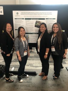 dental hygiene students present at a conference