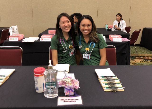 student nurses vounteering at the okinawan festival