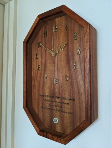 Mary Boland's clock award from alumni chapter