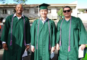 UH Manoa veteran graduates smile for photo 