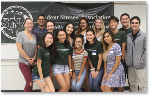 students with guest speaker from the queen's medical center