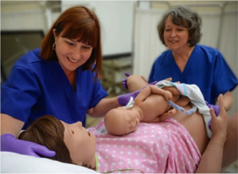 Lucina the obstetrics dummy is cared for by nursing staff