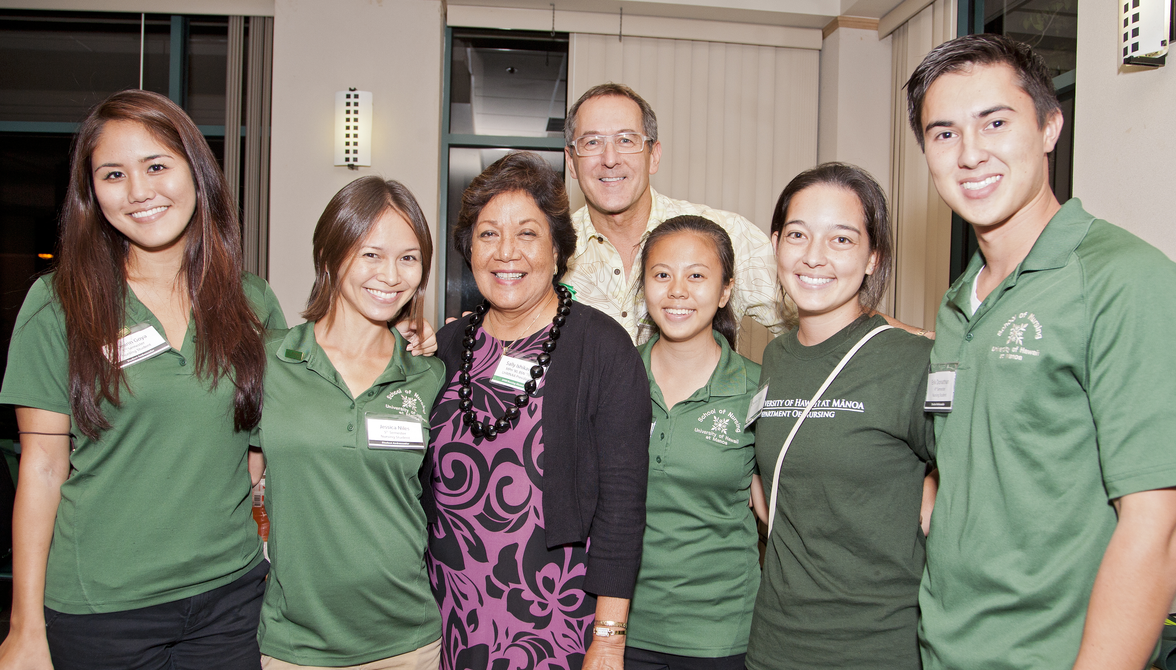 Sally Ishikawa poses with students 